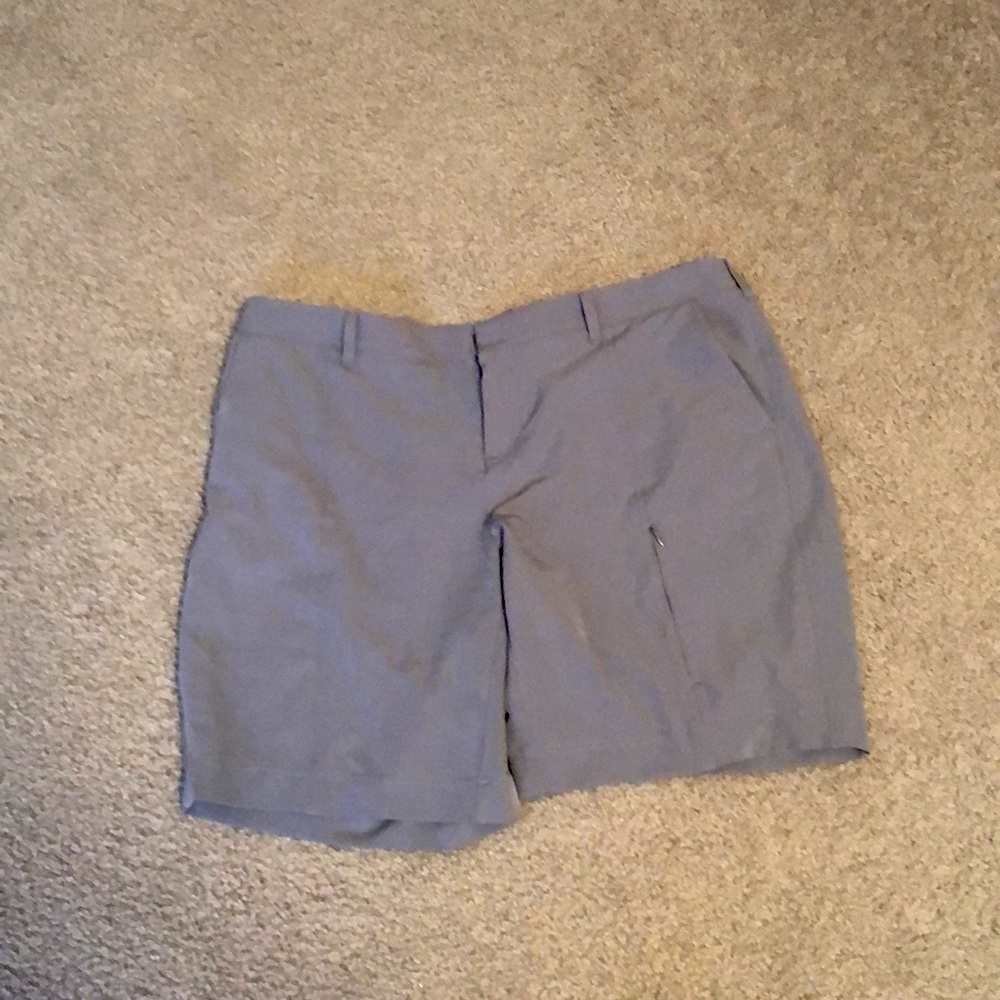 Grey shorts.